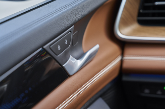 15-inch touchscreen and diamond-stitched leather cabin